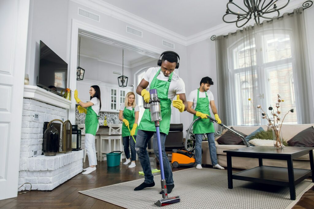 Handsome young african worker of cleaning service